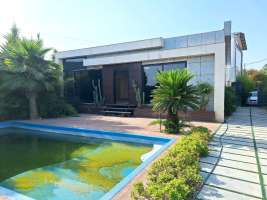 <div class='tp_title'>ویلاباغ استخردار در سرخرود</div><div class='tp_desc'>با سلام
با معرفی یک ویلاباغ زیبا و خوش قیمت در سرخرود ، همراهتان هستم...❕❕❕
این ویلاباغ در یک دهکده توریستی در فاصله ۵ دقیقهای از شهر سرخرود واقع شده است و برای اقامت و سرمایهگذاری بسیار مناسب میباشد...❗️❗️❗️
✖️مــشـخــصــات ویـــلابـــاغ✔️۵۰۰ متر زمین✔️۱۲۰ متر بنا همکف خوش ساخت✔️دو خواب نورگیر دارای کمد دیواری✔️استخر روباز✔️حیاط سرسبز و...</div><div class='row_location'><div class='row_title'>آدرس</div><div class='tp_location'>دهکدههای توریستی سرخرود<br />آدرس: مازندران، سرخرود، املاک نفار</div></div><div class='row_contact'><div class='row_title'>اطلاعات تماس</div><div class='tp_contact'>شیما قیصریان</div></div><div style='clear:both'></div><div class='title'>تصاویر</div><div class='images_box'><img src='/components/com_djclassifieds/images/item/1/1251_img_20250531_124906_ths.jpg' width='267' height='200' /><img src='/components/com_djclassifieds/images/item/1/1251_fc0483e73525e5aec37a91257483be58_ths.jpg' width='267' height='200' /><img src='/components/com_djclassifieds/images/item/1/1251_07707327b3d468a6bec2cef13956e96e_ths.jpg' width='267' height='200' /></div><div style='clear:both'></div> ویلاباغ استخردار در سرخرود