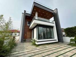 <div class='tp_title'>خرید ویلا مدرن مستقل در ونوش رویان </div><div class='tp_desc'>سلام
با معرفی یه ویلا مدرن مستقل در ونوش رویان همراهتون هستم .
مشخصات ویلا :
۳۰۰ متر زمین
۳۵۰ متر بنا مدرن
۴ خواب ( کلوزت و مستر )
کمد دیواری ، کابینت ، هود و گاز رومیزی ، شیرآلات نصب
شومینه
آلاچیق
آتشگاه
تراس بزرگ و قابل چیدمان با چشم اندازی فوقالعاده
روف گاردن با دید به کوه و جنگل
نورپردازی ساختمان
...</div><div class='row_location'><div class='row_title'>آدرس</div><div class='tp_location'>رویان<br />آدرس: مازندران، سرخرود، املاک نفار</div></div><div class='row_contact'><div class='row_title'>اطلاعات تماس</div><div class='tp_contact'>افشار</div></div><div style='clear:both'></div><div class='title'>تصاویر</div><div class='images_box'><img src='/components/com_djclassifieds/images/item/1/1410_4191d57e-1589-4a00-9415-4f3eb41344ca-scaled_ths.jpg' width='267' height='200' /><img src='/components/com_djclassifieds/images/item/1/1410_a1c82182-88e7-4223-ac46-f7f946218ae3-scaled_ths.jpg' width='267' height='200' /><img src='/components/com_djclassifieds/images/item/1/1410_47327215-0789-44a6-9425-497df1b1073f-scaled_ths.jpg' width='267' height='200' /></div><div style='clear:both'></div> خرید ویلا مدرن مستقل در ونوش رویان